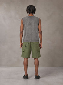 Model wearing SM Sig. Reverse Washed Tank Top in Pure Grey, rear view.