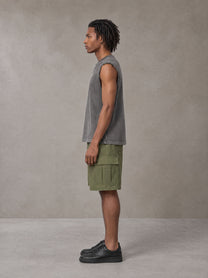 Model wearing SM Sig. Reverse Washed Tank Top in Pure Grey, side profile.
