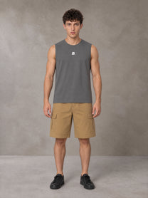 Model wearing SM Sig. Sleeveless Tank Top in Pure Grey, front view.