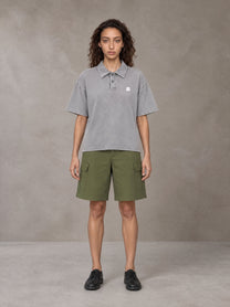 Model wearing SM Sig. Snow Washed Polo T-shirt in Polished Silver, front view.