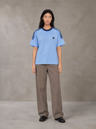 Model wearing SM Sig. Striped T-shirt in Blair Blue, front view.