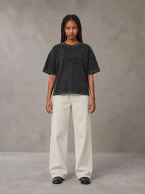 Model wearing SM Sig. Waffle Washed Boxy T-shirt in Midnight Black, front view.