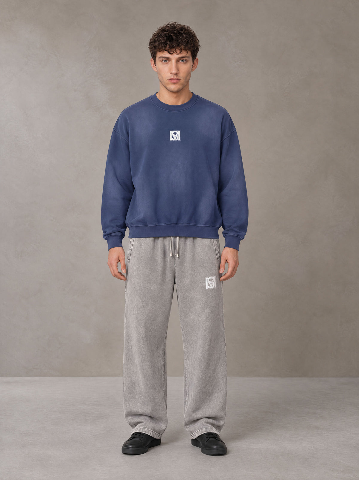 Model wearing SM Sunfade Fleeced Sweatshirt in Oxford Navy, front view.