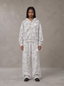 Model wearing the SM Cloud Fade Hoodie and SM Cloud Fade Sweatpants in Cloud Fade, front view.