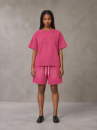 Model wearing the SM Echo Fleur T-shirt and SM Echo Fleur Shorts in Cherry Blush, front view.
