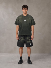 Model wearing the SM Vintage Washed T-shirt and SM Vintage Washed Shorts in Midnight Black, front view.
