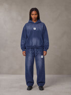 Model wearing the SM Sunfade Fleeced Hoodie and SM Sunfade Fleeced Sweatpants in Oxford Navy, front view.