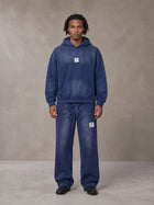 Model wearing the SM Sunfade Fleeced Hoodie and SM Sunfade Fleeced Sweatpants in Oxford Navy, front view.