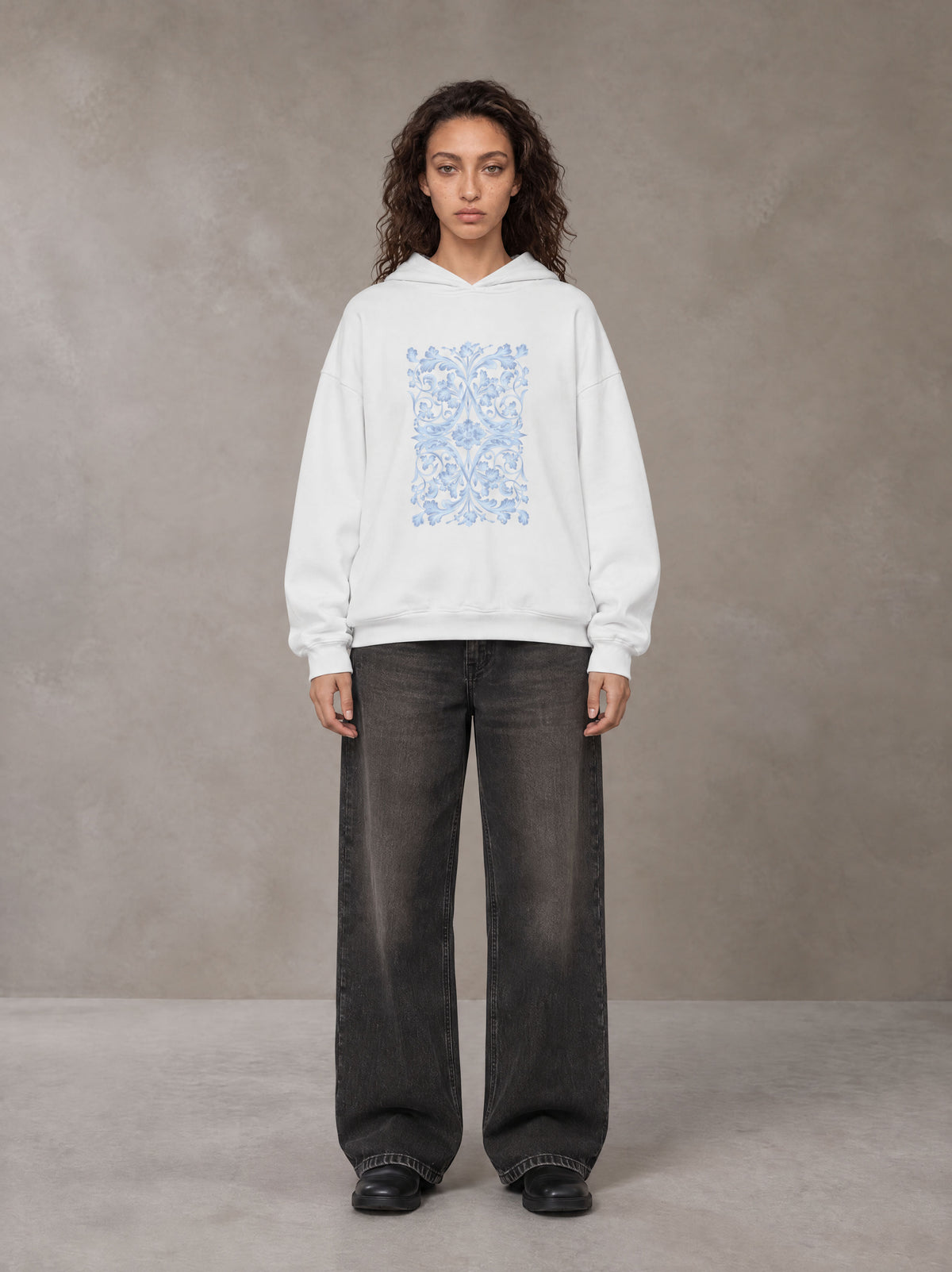 Model wearing the SM Baroque Bloom Hoodie in Lucent White, front view.