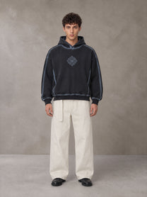Model wearing the SM Eternal Fleur Belted Trousers in Ivory White, front view.