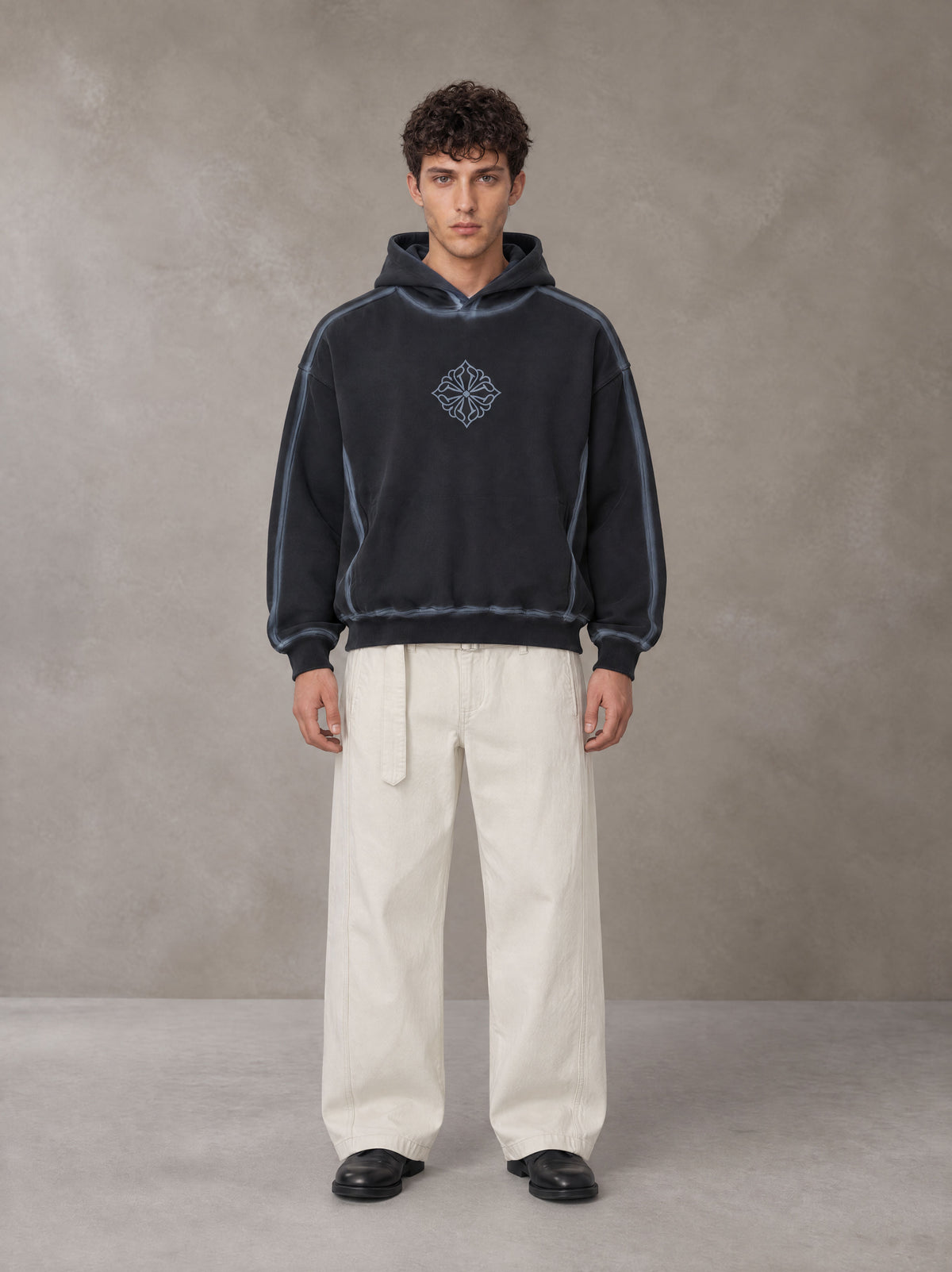 Model wearing the SM Eternal Fleur Belted Trousers in Ivory White, front view.