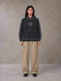 Model wearing the SM Eternal Fleur Cargo Trousers in Camel Tan, front view.