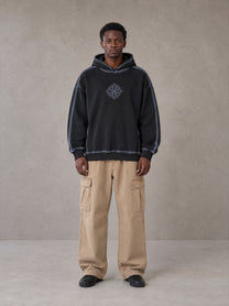 Model wearing the SM Eternal Fleur Cargo Trousers in Camel Tan, front view.