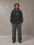 Model wearing the SM Eternal Fleur Cargo Trousers in Deep Charcoal, front view.