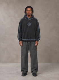 Model wearing the SM Eternal Fleur Cargo Trousers in Deep Charcoal, front view.