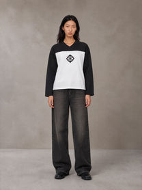 Model wearing the SM Eternal Fleur Forme T-shirt in Midnight Black, front view.