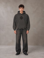 Model wearing the SM Eternal Fleur Hoodie in Deep Charcoal, front view.