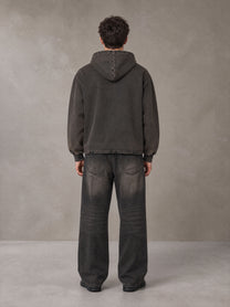 Model wearing the SM Eternal Fleur Hoodie in Deep Charcoal, rear view.