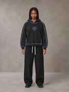Model wearing the SM Eternal Fleur Straight Leg Cargo Pants in Midnight Black, front view.