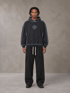 Model wearing the SM Eternal Fleur Straight Leg Cargo Pants in Midnight Black, front view.