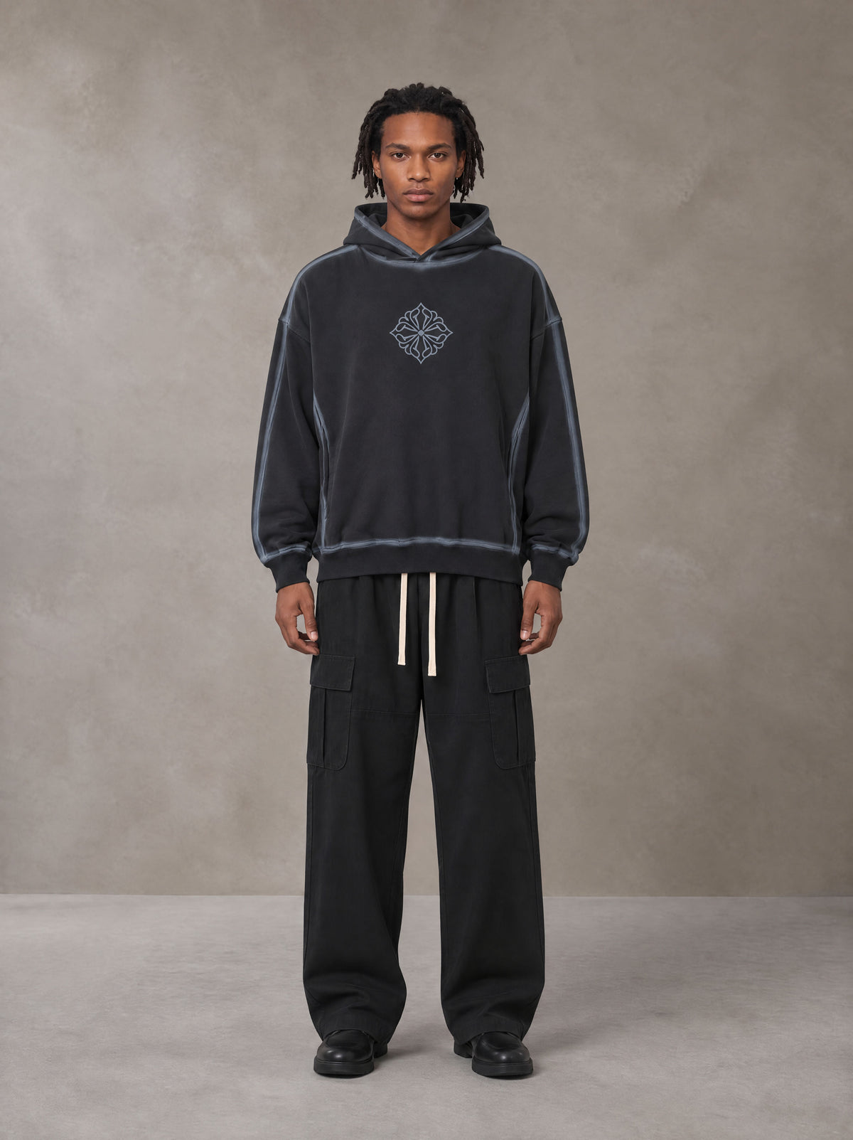 Model wearing the SM Eternal Fleur Straight Leg Cargo Pants in Midnight Black, front view.