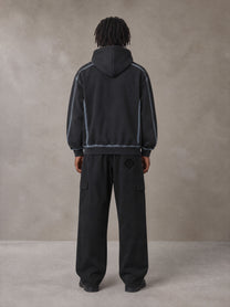Model wearing the SM Eternal Fleur Straight Leg Cargo Pants in Midnight Black, rear view.