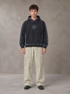 Model wearing the SM Eternal Fleur Straight Leg Cargo Pants in Oat Grey, front view.