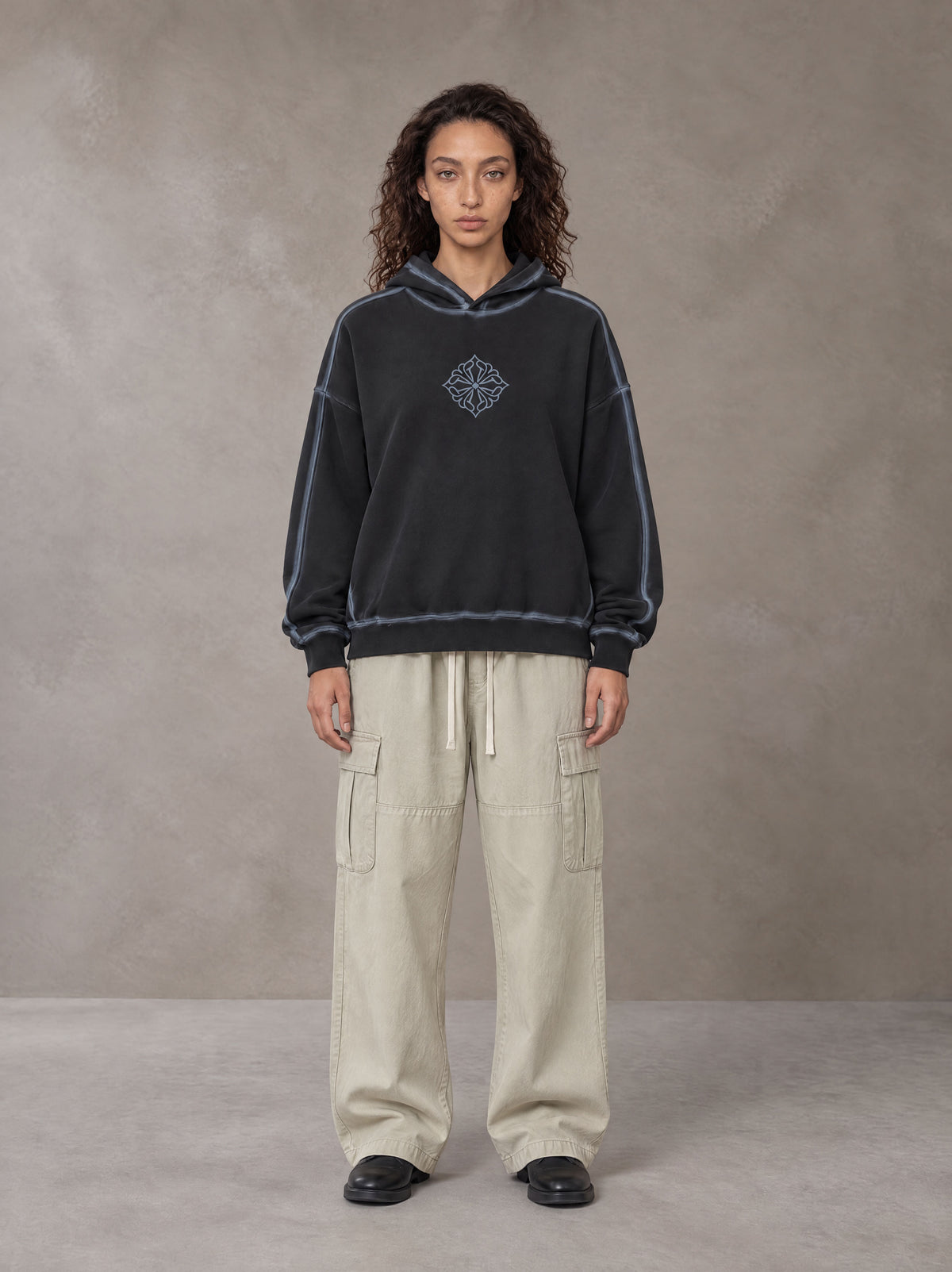 Model wearing the SM Eternal Fleur Straight Leg Cargo Pants in Oat Grey, front view.