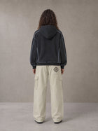 Model wearing the SM Eternal Fleur Straight Leg Cargo Pants in Oat Grey, rear view.