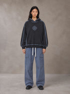 Model wearing the SM Eternal Fleur Straight Leg Cargo Pants in Slate Blue, front view.