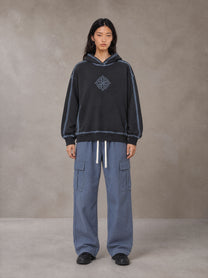 Model wearing the SM Eternal Fleur Straight Leg Cargo Pants in Slate Blue, front view.