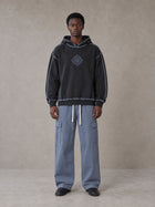 Model wearing the SM Eternal Fleur Straight Leg Cargo Pants in Slate Blue, front view.
