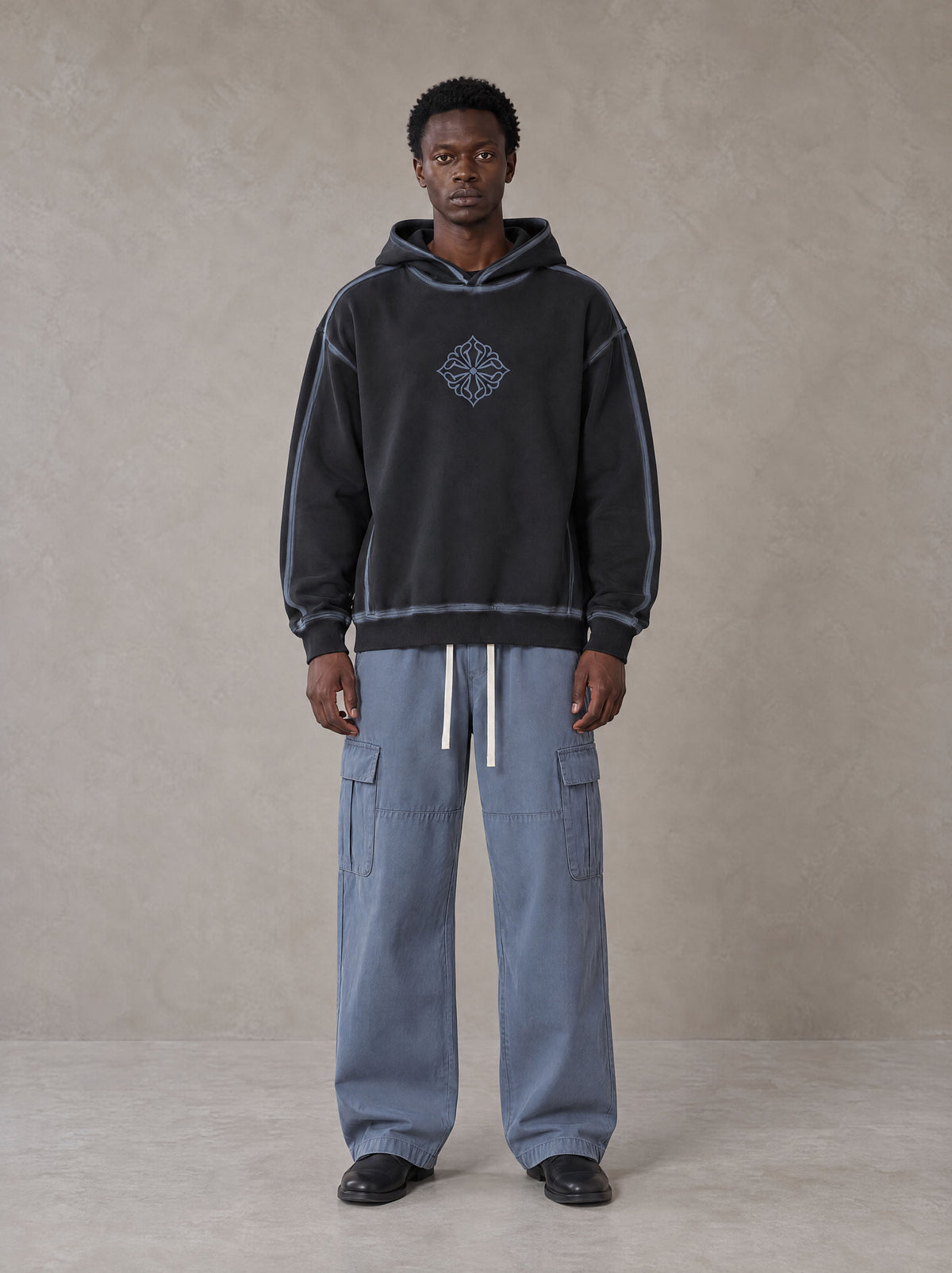 Model wearing the SM Eternal Fleur Straight Leg Cargo Pants in Slate Blue, front view.