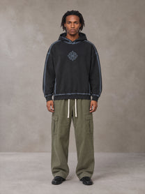Model wearing the SM Eternal Fleur Straight Leg Cargo Pants in Heritage Khaki, front view.