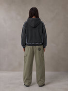 Model wearing the SM Eternal Fleur Straight Leg Cargo Pants in Heritage Khaki, rear view.