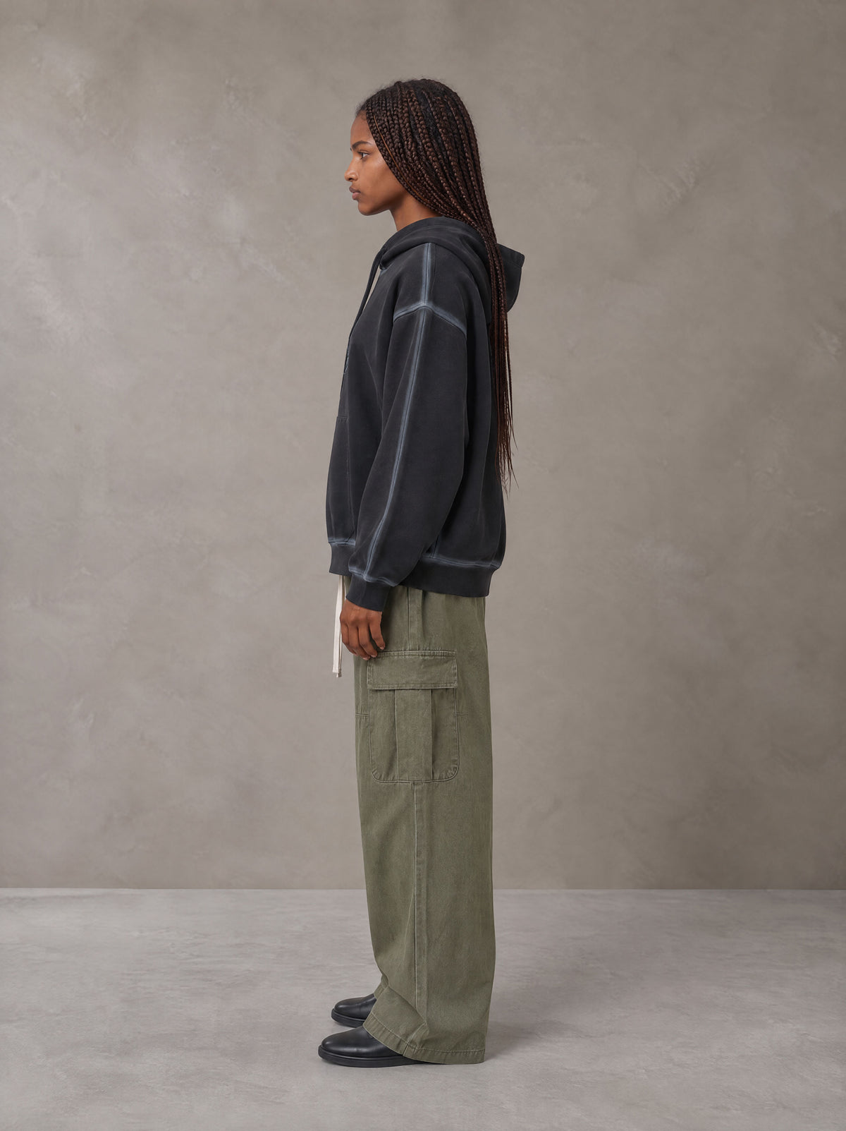 Model wearing the SM Eternal Fleur Straight Leg Cargo Pants in Heritage Khaki, side profile.
