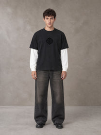 Model wearing the SM Eternal Fleur T-shirt in Midnight Black, front view.