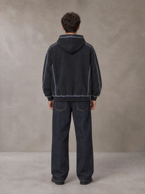 Model wearing the SM Heritage Straight Leg Denim Jeans in Ebony Clay, rear view.