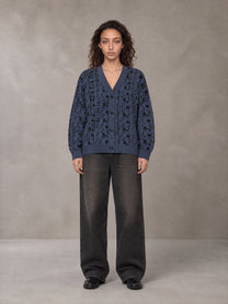 Model wearing the SM Abstract Jacquard Knitted Cardigan in Oxford Navy, front view.
