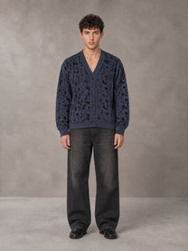 Model wearing the SM Abstract Jacquard Knitted Cardigan in Oxford Navy, front view.