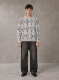 Model wearing the SM Argyle Jacquard Knitted Sweatshirt in Polished Silver, front view.