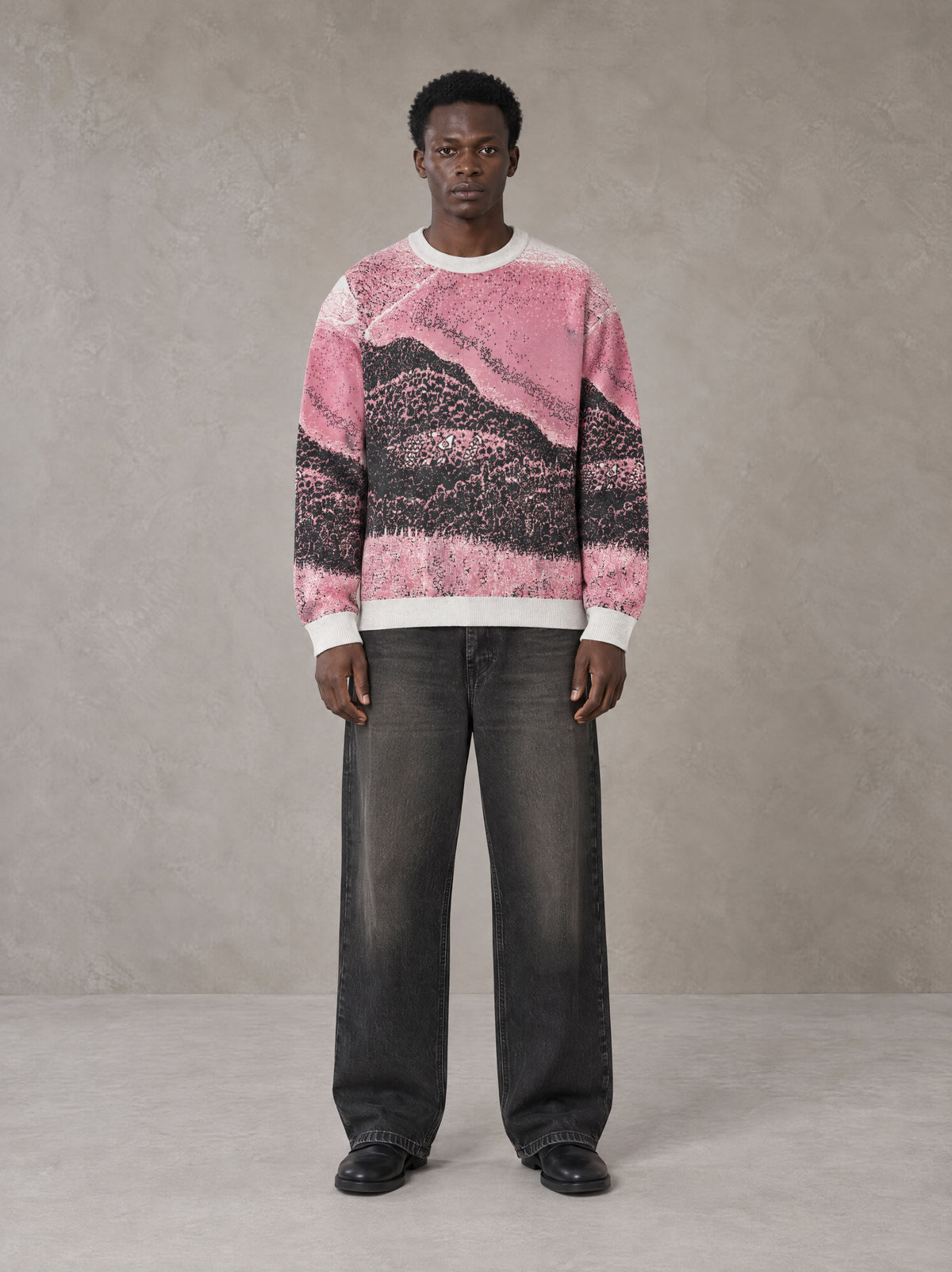 Model wearing the SM Seascape Jacquard Knitted Sweatshirt in Blush Rose, front view.