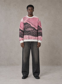 Model wearing the SM Seascape Jacquard Knitted Sweatshirt in Blush Rose, front view.