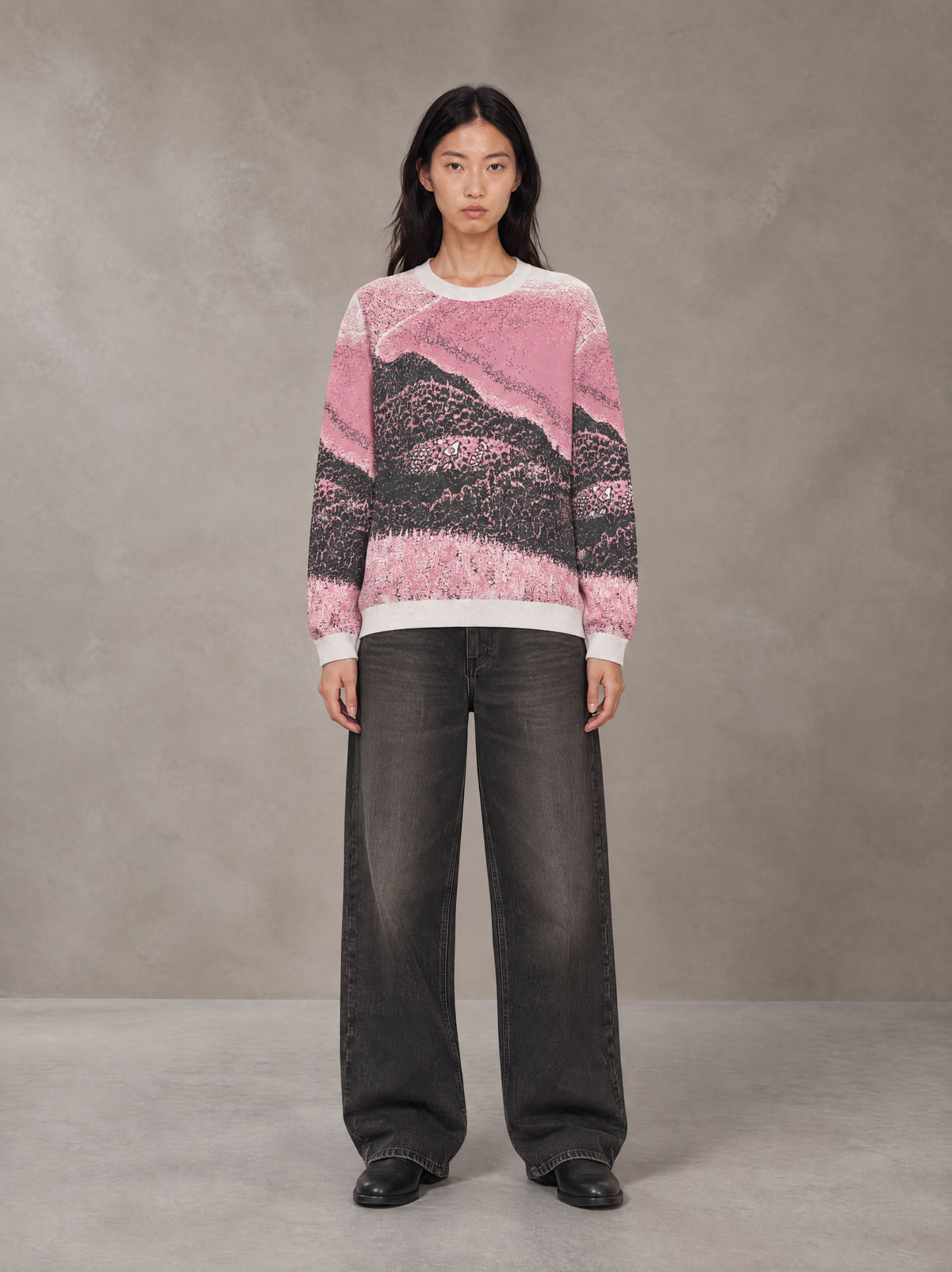Model wearing the SM Seascape Jacquard Knitted Sweatshirt in Blush Rose, front view.