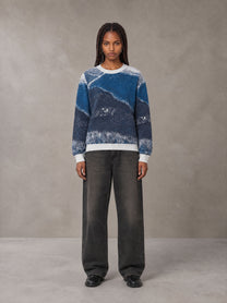 Model wearing the SM Seascape Jacquard Knitted Sweatshirt in Chambray, front view.