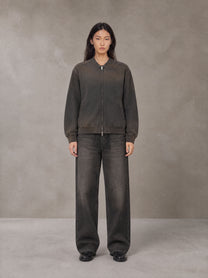 Model wearing the SM Sig. Shadow Fade Bomber Jacket in Ashen Grey, front view.