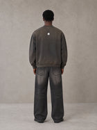Model wearing the SM Sig. Shadow Fade Bomber Jacket in Ashen Grey, rear view.