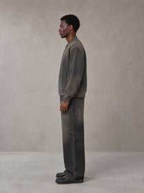 Model wearing the SM Sig. Shadow Fade Bomber Jacket in Ashen Grey, side profile.