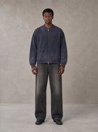 Model wearing the SM Sig. Shadow Fade Bomber Jacket in Deep Purple, front view.
