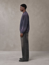 Model wearing the SM Sig. Shadow Fade Bomber Jacket in Deep Purple, side profile.